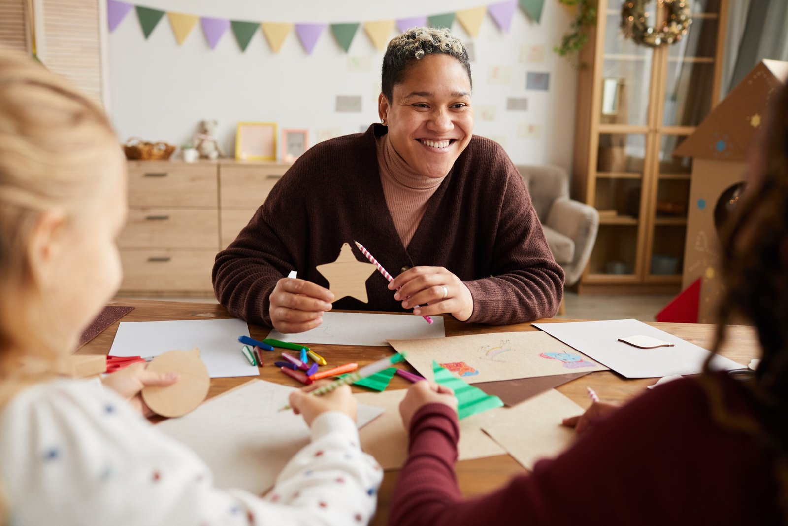 Smiling Female Teacher Enjoying Class with Children img-8